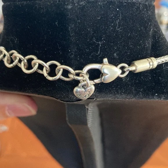 Intricate Silver Necklace with Blue Gem Pendant - Picture 2 of 3